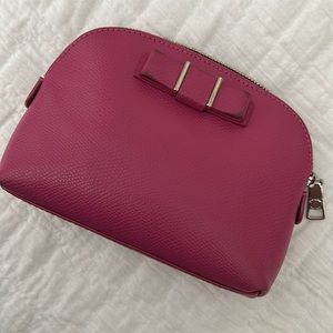 Coach pink cosmetic bag with bow